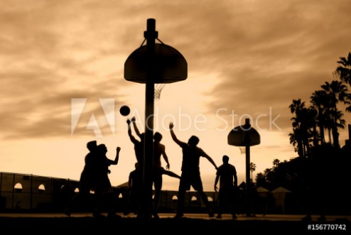 Picture of Basketball players at sunset